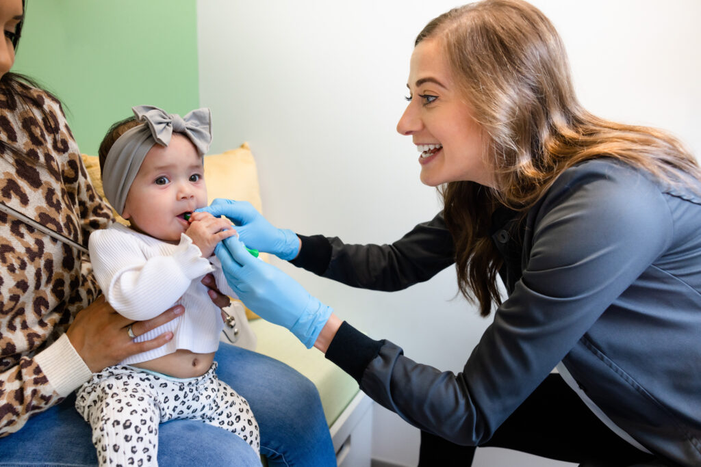 Kirkland, WA, pediatric dentist checking baby for lip and tongue ties before frenectomies 98034