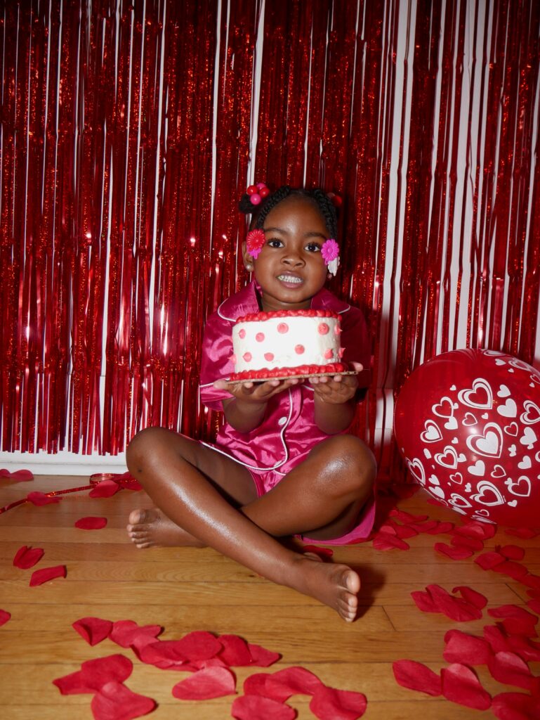 child smiling with cake before needing an emergency pediatric dentist